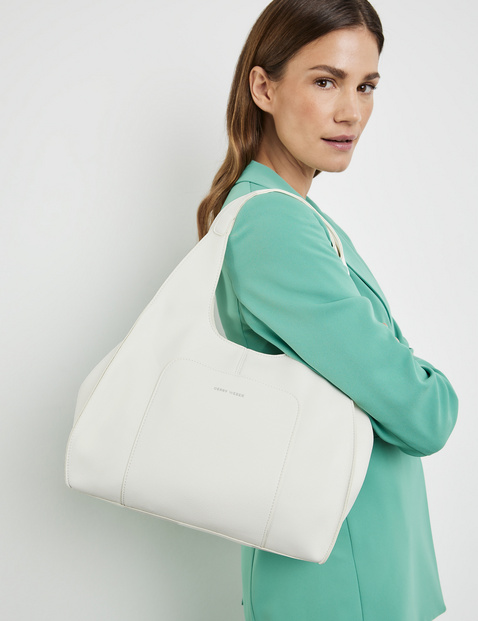 Modische Handtasche mit Kosmetiktäschchen