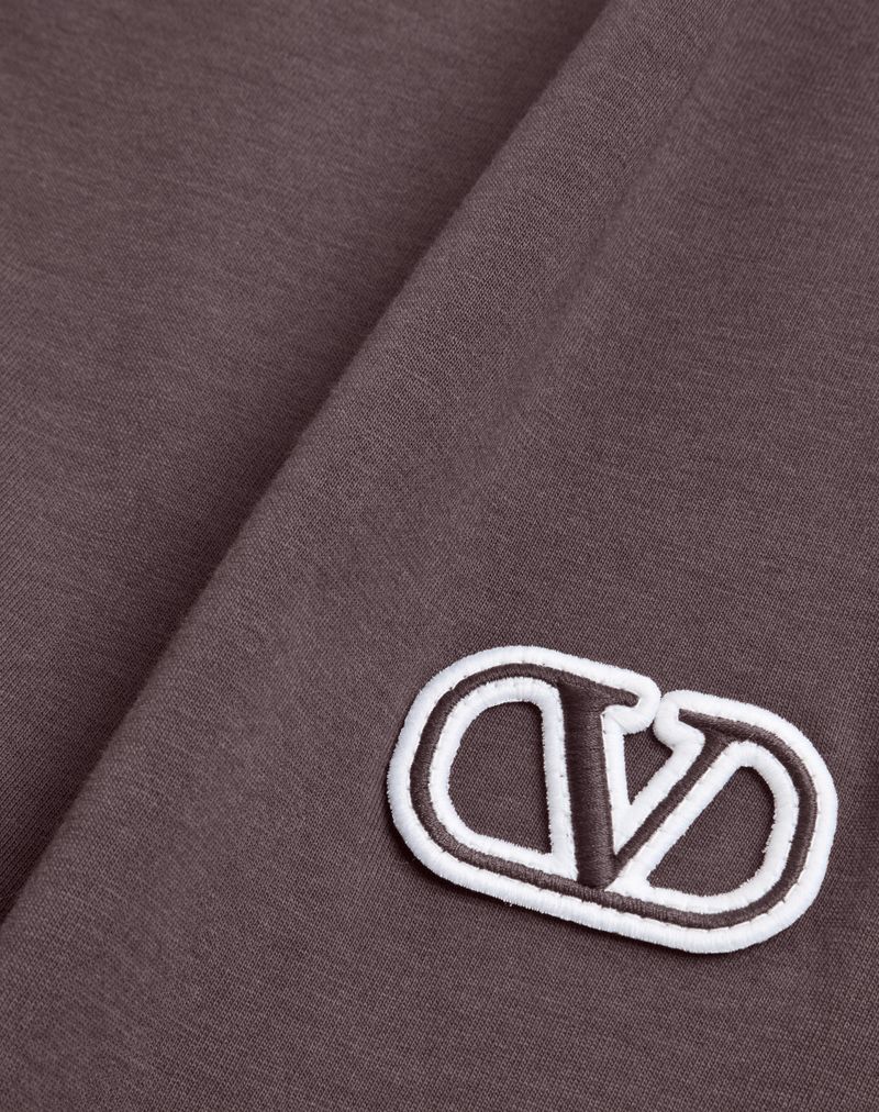 Camiseta de algodão com patch exclusivo Vlogo