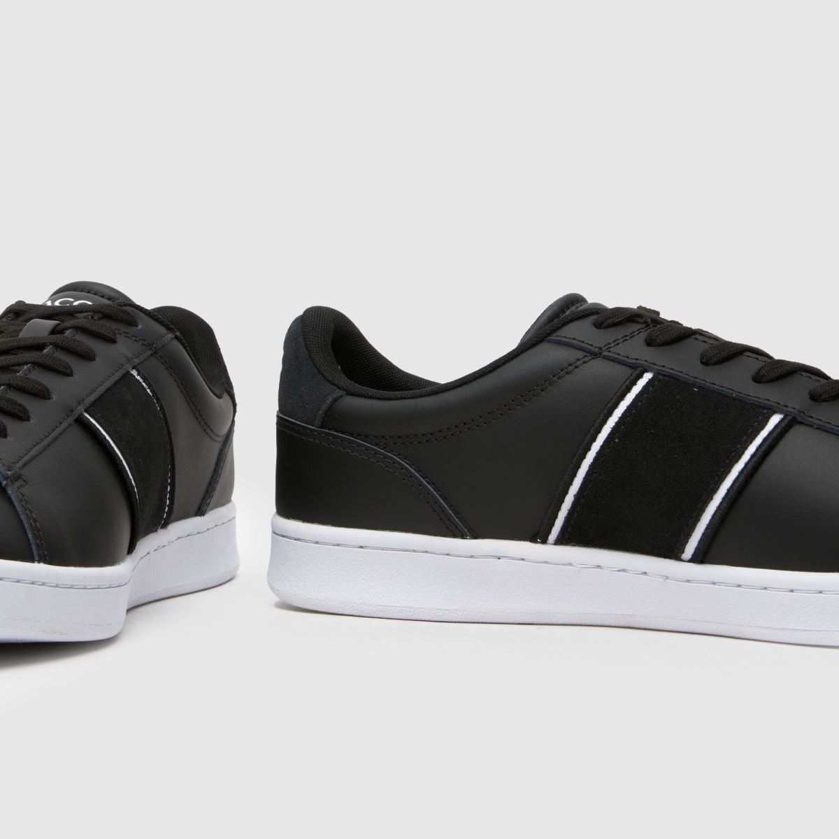 Lacoste – Carnaby – Svarta och vita träningsskor
