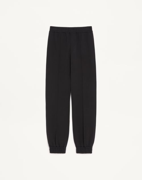 Valentino katoenen joggingbroek met V-gouden accenten