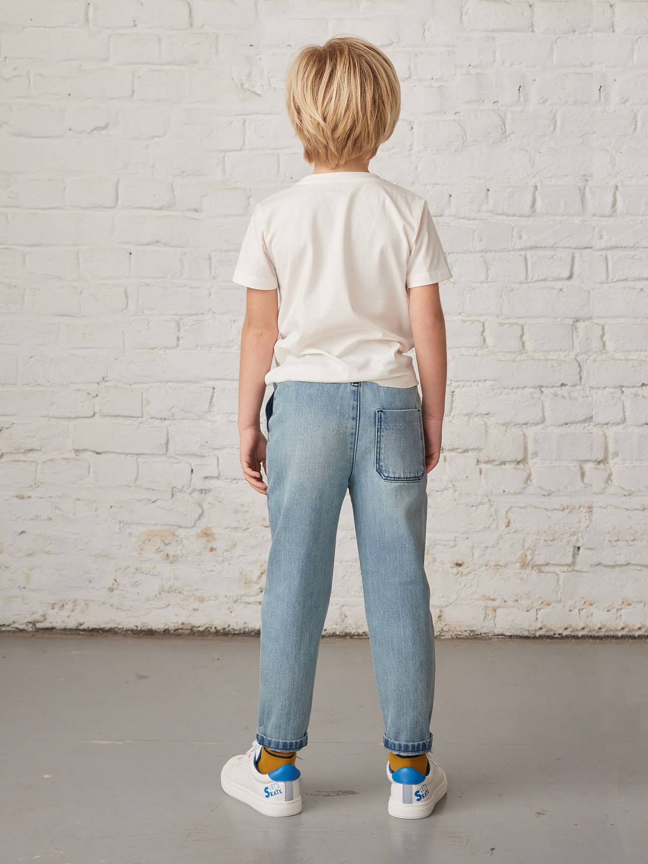 Jean droit loose effet patchs garçon denim bleached