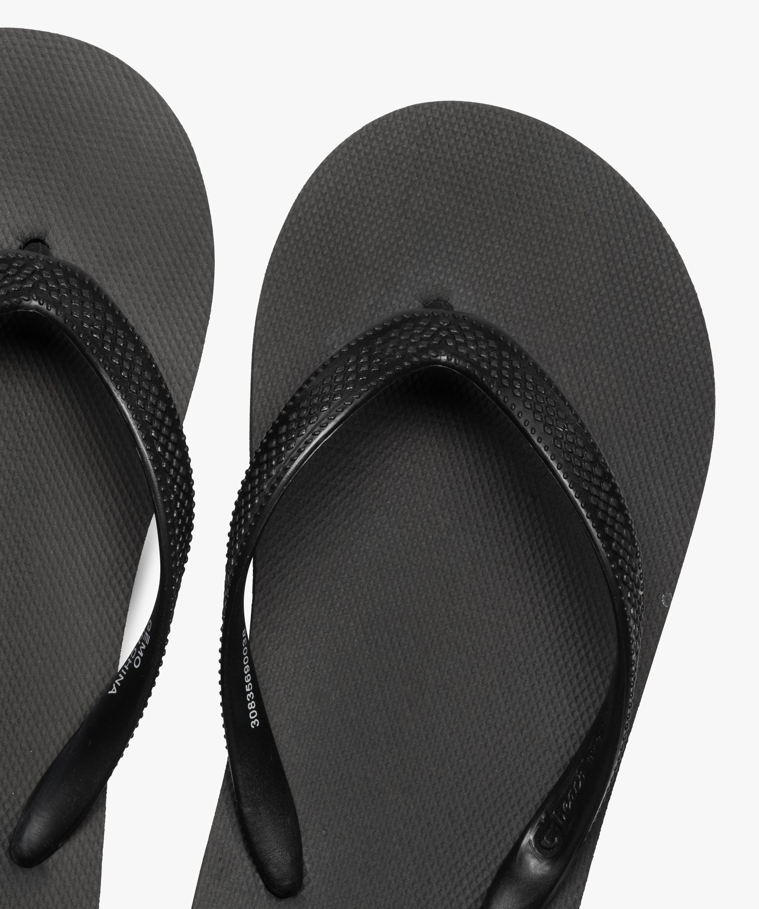 Tongs Garçon unies avec brides à reliefs noir | GEMO