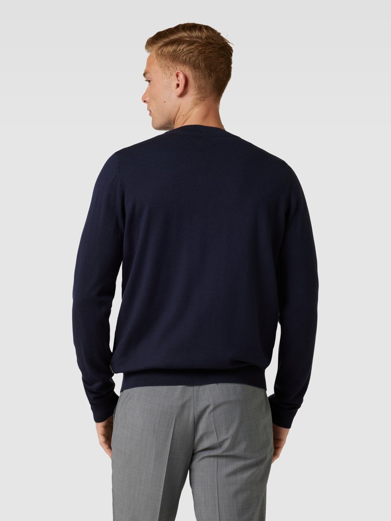 Strickjacke aus Wolle mit V-Ausschnitt in marineblau