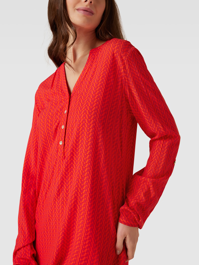 Blusenshirt mit Allover-Muster in dunkel orange