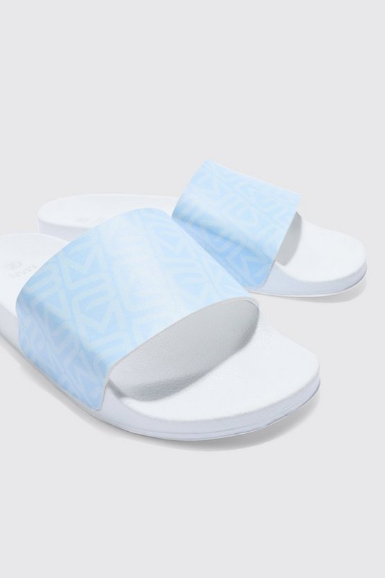 Blaue Slides mit Man-Logo