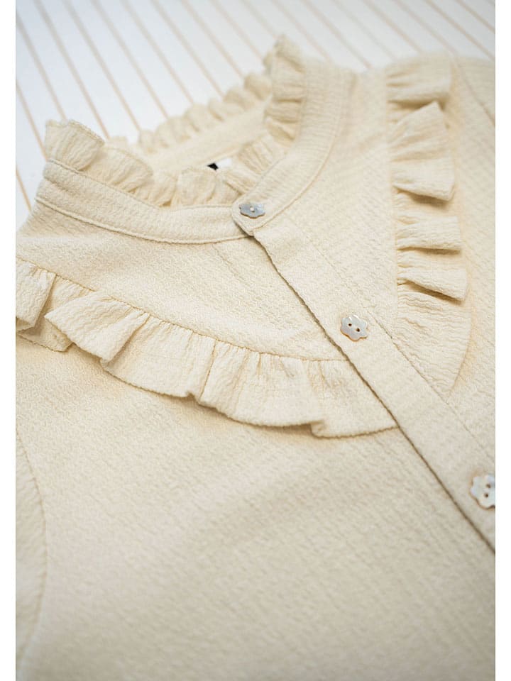 B.Nosy Bluse 