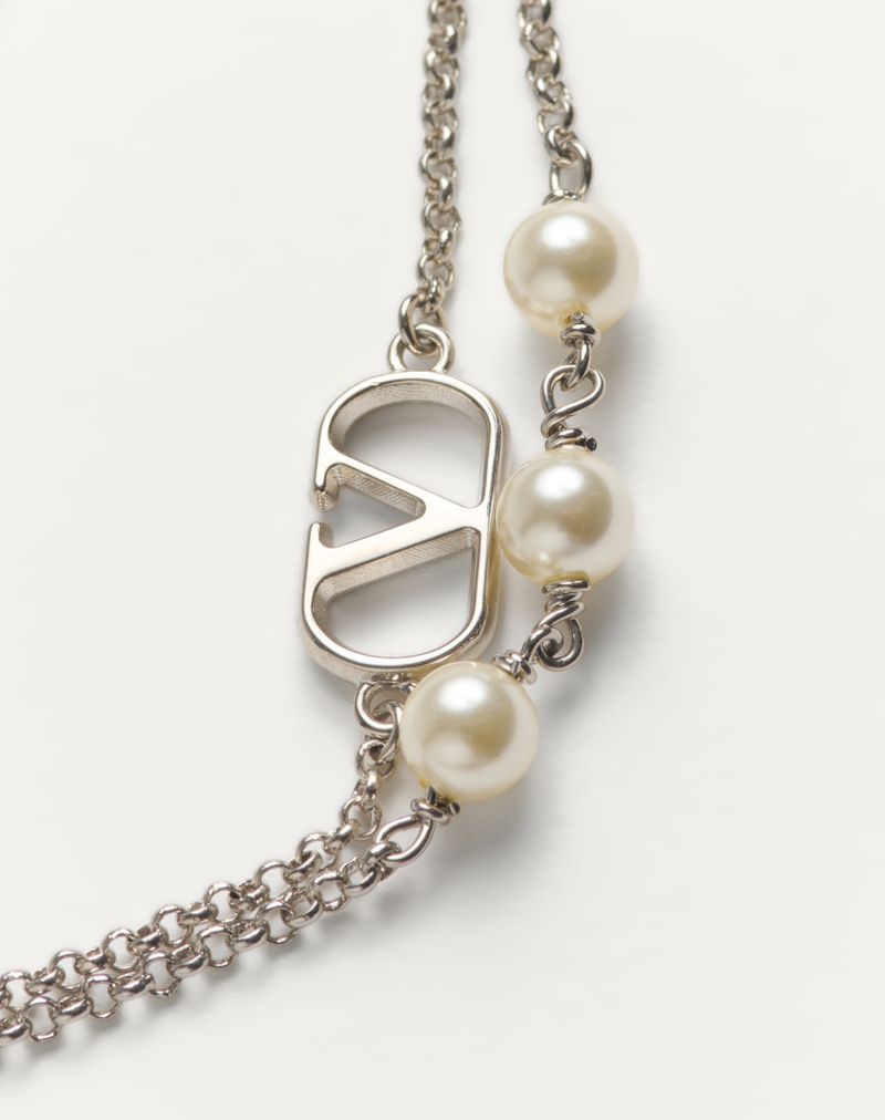 Pulseira exclusiva VLogo em metal e pérolas Swarovski®
