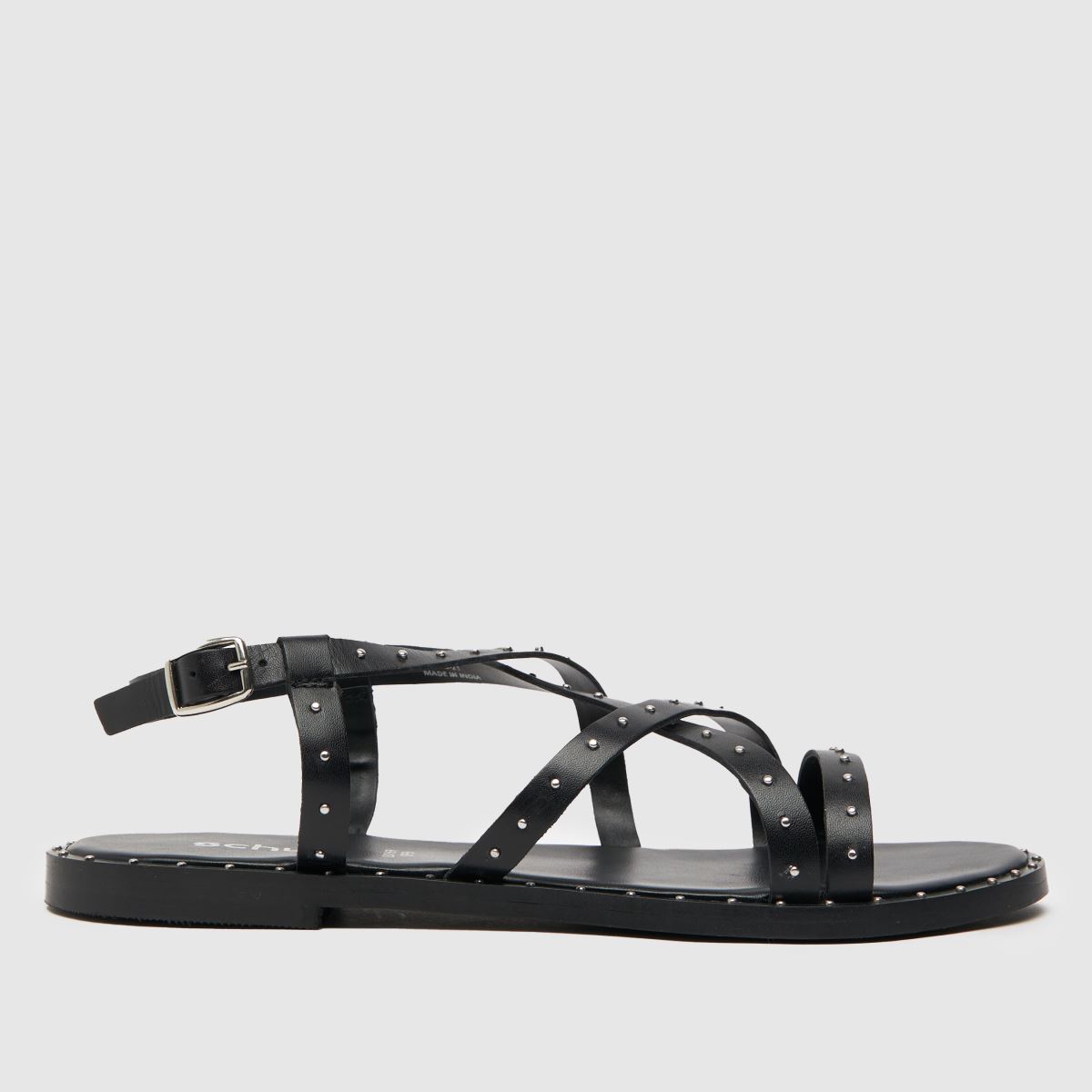 Schuh Tadlow szegecses lapos talpú szandál fekete színben
