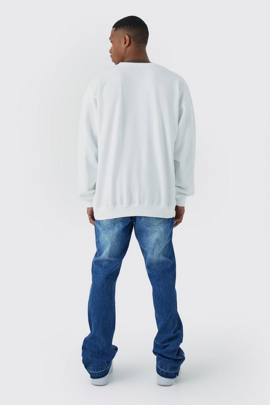 Slim-Fit Schlagjeans mit Druckknöpfen