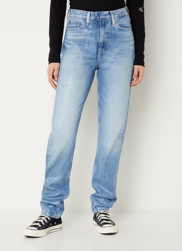 Calvin Klein high-waist slim-fit jeans with a medium wash