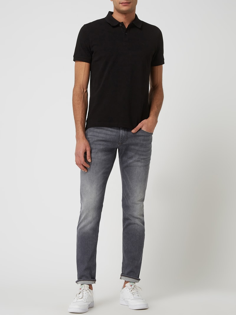 Regular Fit Poloshirt aus Baumwolle in schwarz