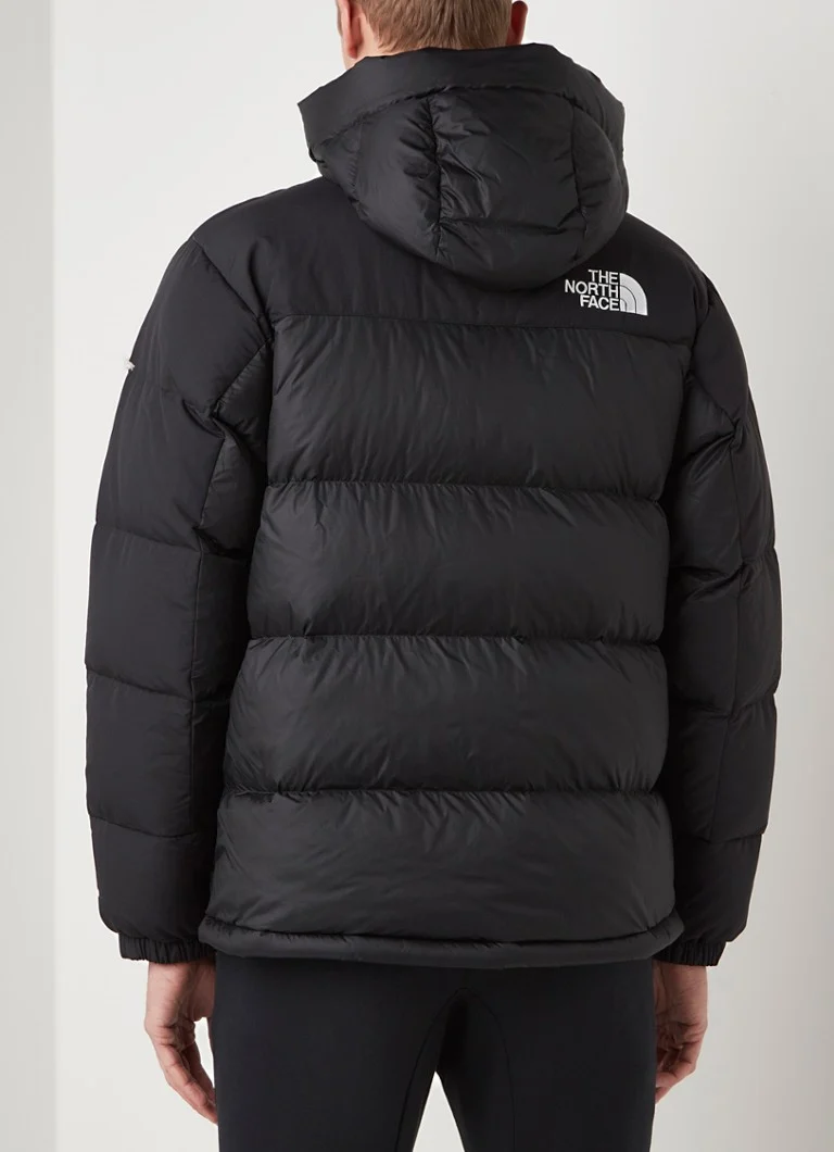 Jaqueta puffer The North Face Himalayan com enchimento de plumas e capuz.