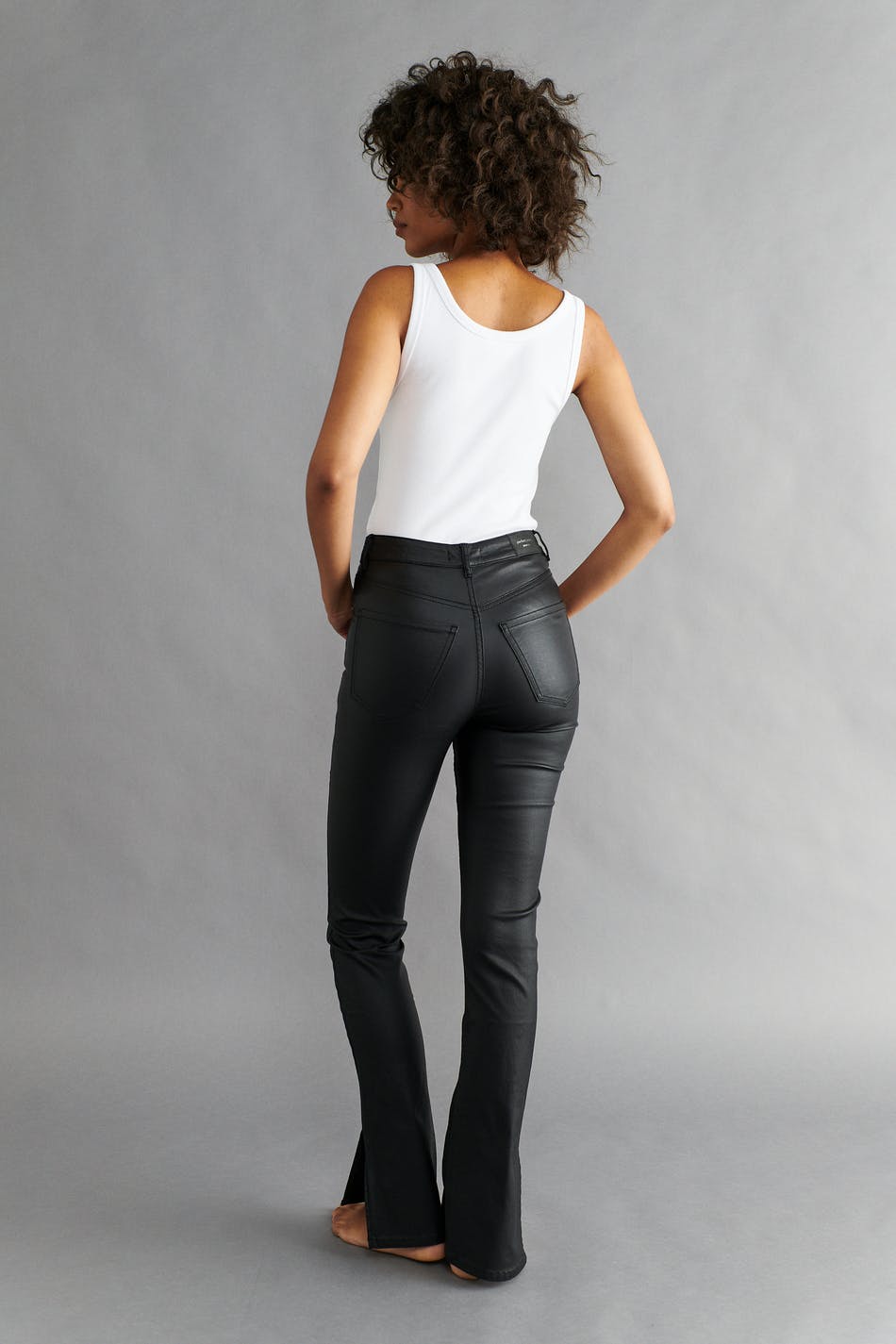 Coated slit jeans