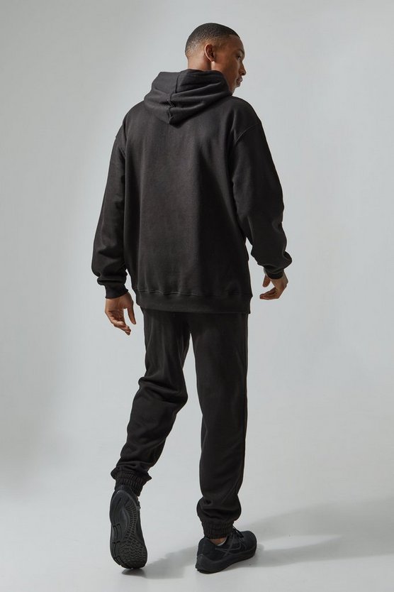 Oversize Man Active Trainingsanzug mit Print und Kapuze