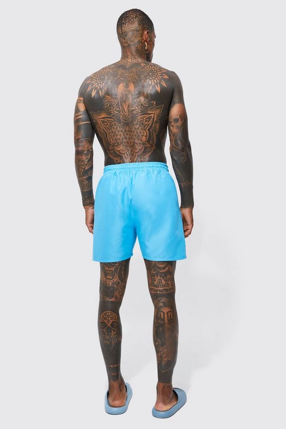 Man Signature mittellange Badehose