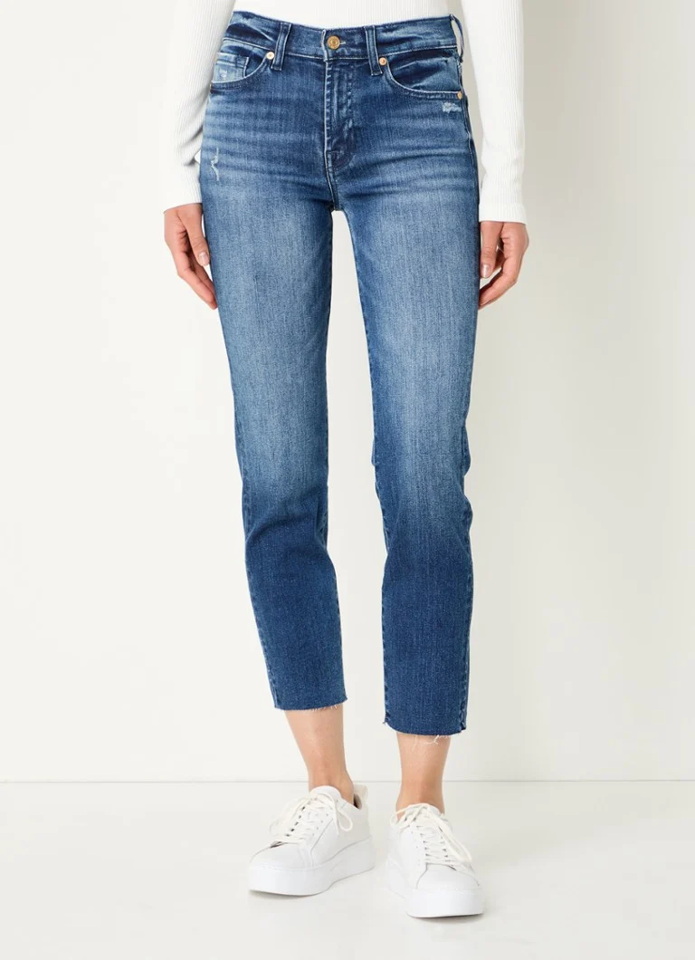 Pantaloni scurți skinny din denim Roxanne cu talie înaltă de la 7 For All Mankind, într-o nuanță medie.