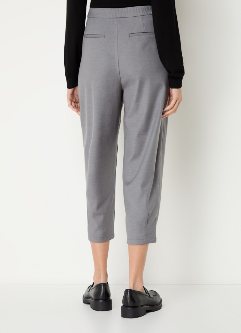Pantaloni Benetton cu talie înaltă, mulați și crop, confecționați din amestec de lână, cu buzunare laterale.