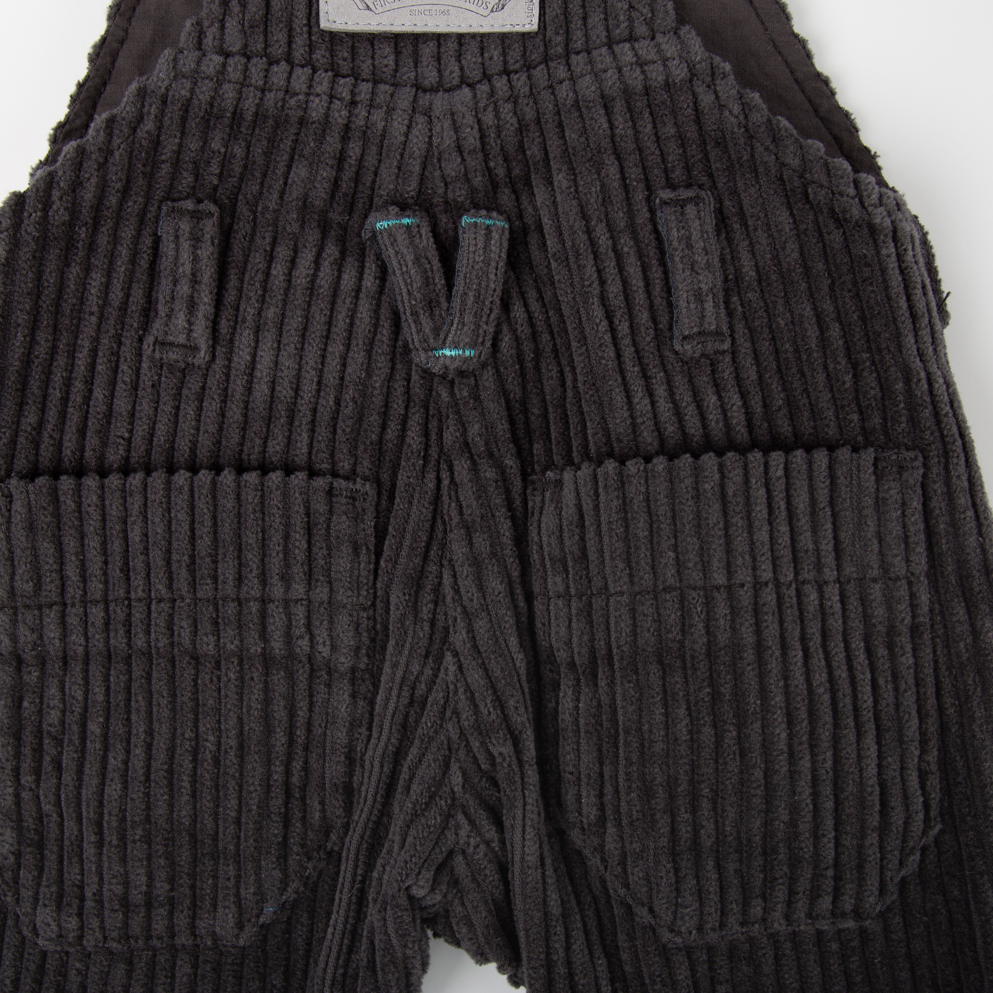 Dunkelgraue Baby Cord Latzhose