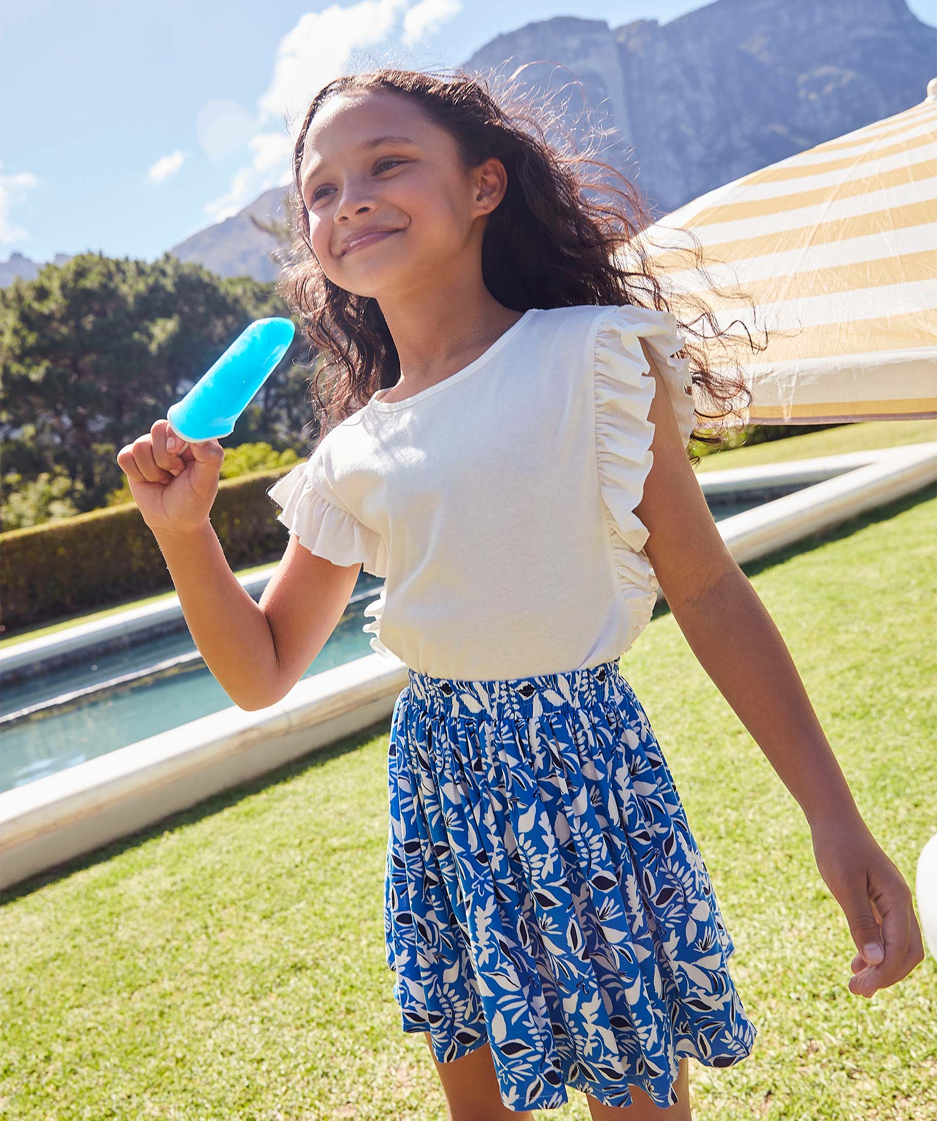 Jupe fille à motif feuillage et taille élastique bleu | GEMO