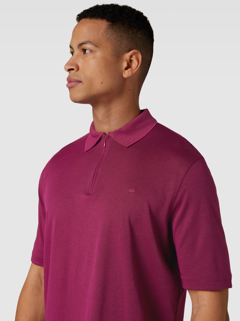 Poloshirt mit Reißverschluss in fuchsia