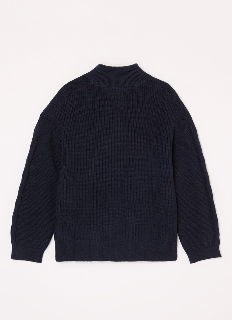 Pulover Tommy Hilfiger confecționat dintr-un amestec subțire de lână, închis cu fermoar scurt.