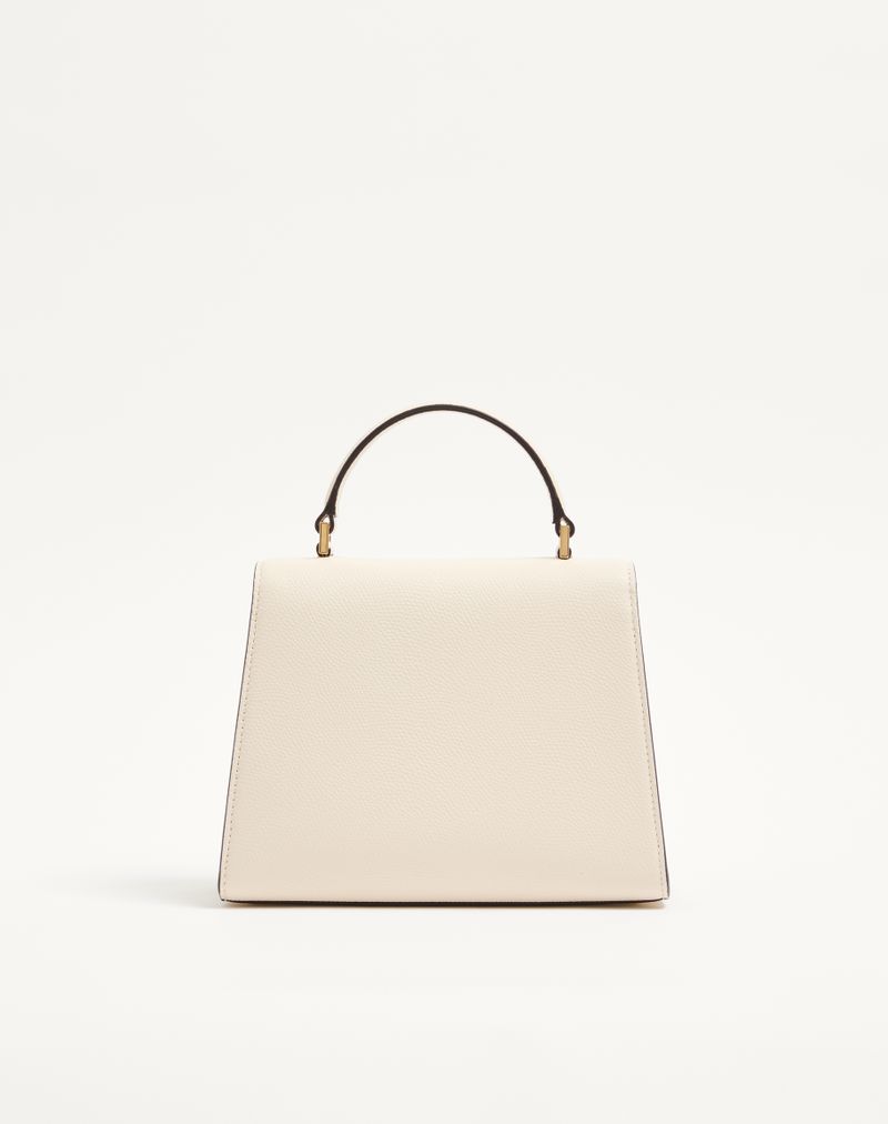Sac à main Valentino Garavani Vsling petit modèle en cuir de veau grainé avec logo bijou