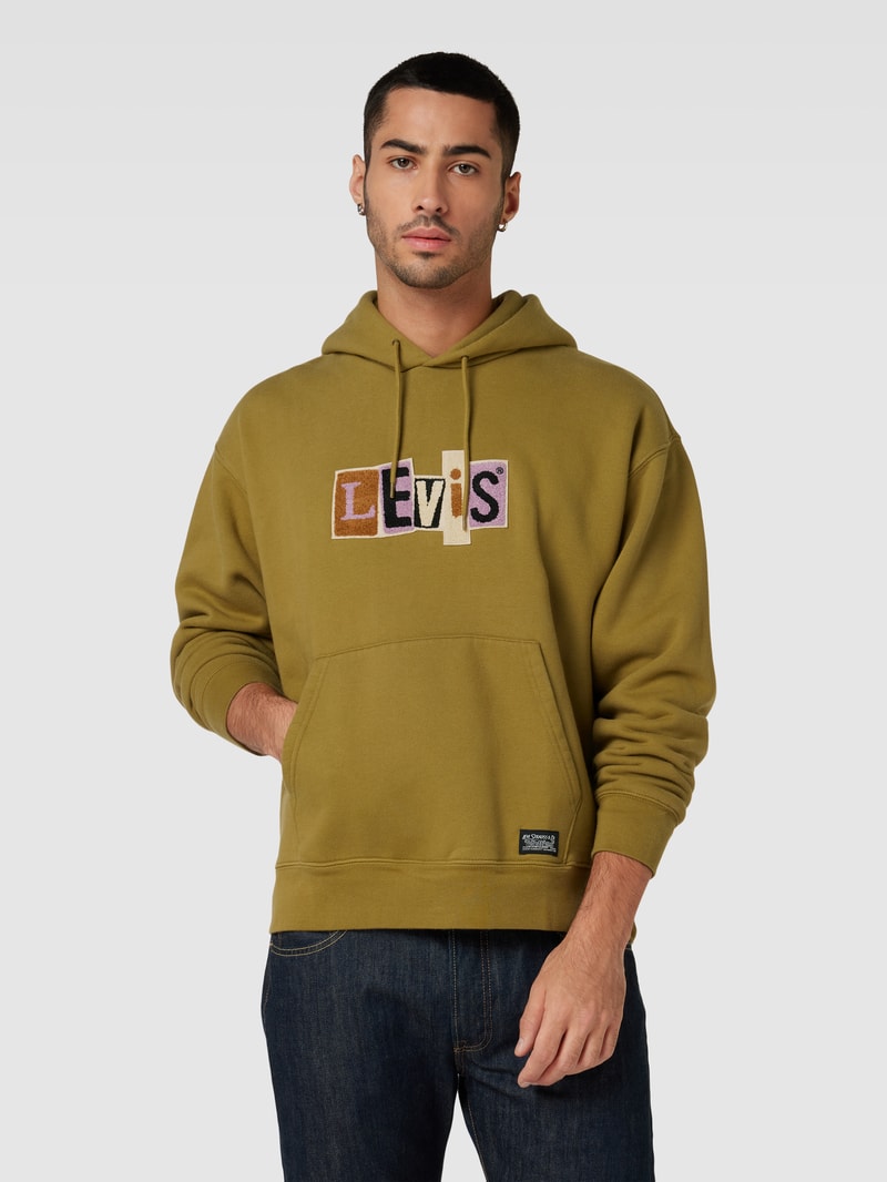 Hoodie mit Label-Patches Modell 'SKATE' in grasgrün