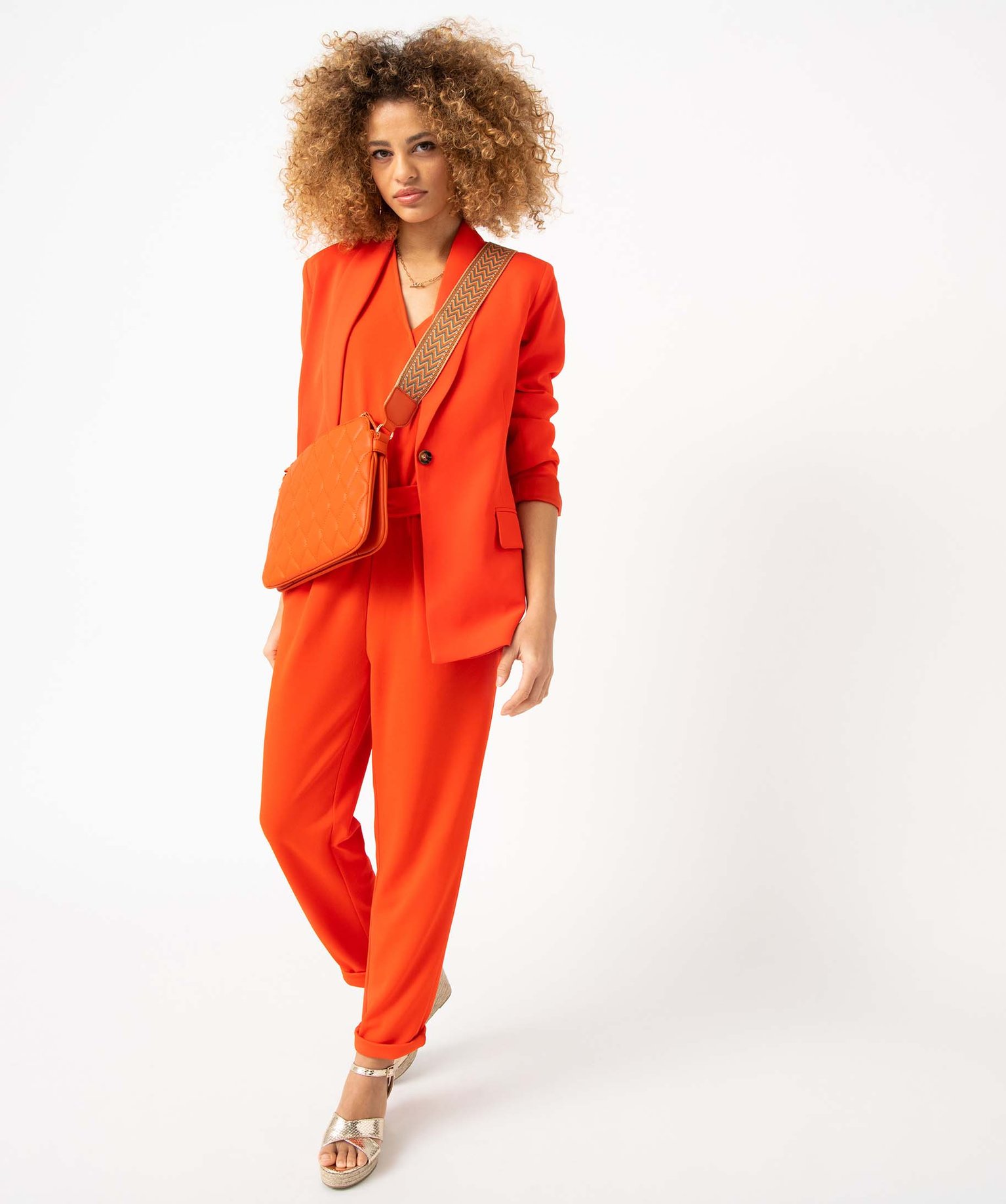 Combinaison pantalon femme unie avec haut cache-coeur orange | GEMO