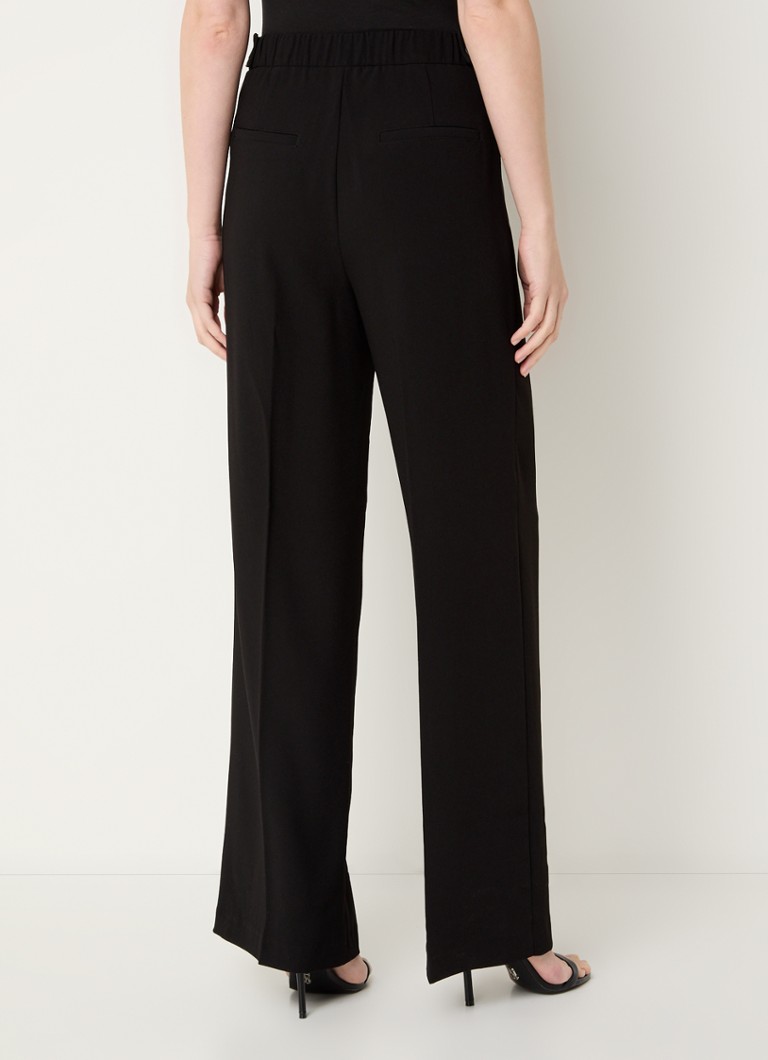 Pantaloni Lucas Dante 6 cu talie înaltă, cu talie largă și cu o cută bine definită.