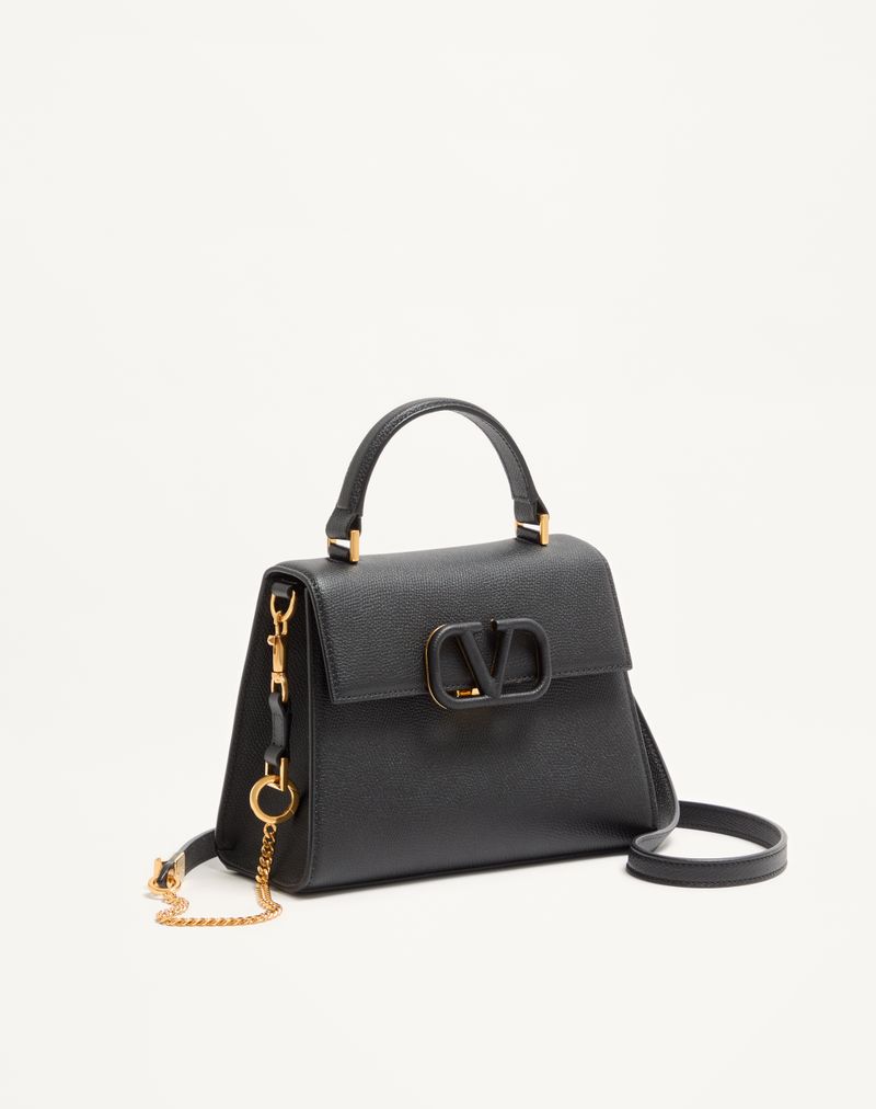 Bolsa Valentino Garavani Vsling pequena em couro de bezerro granulado.