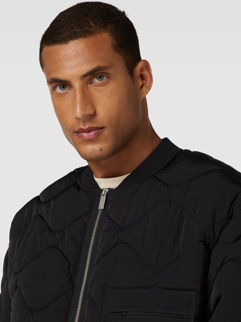 Bomberjacke mit Eingrifftaschen in schwarz