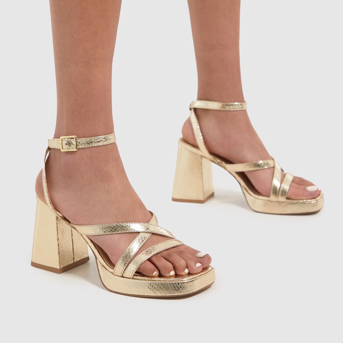 Zlaté vysoké podpatky Schuh Star s pásky na platformě