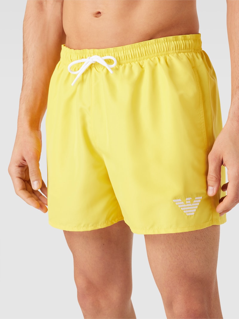 Badehose mit Label-Stitching Modell 'ESSENTIAL' in gelb