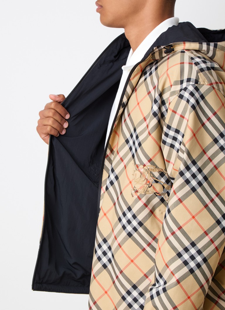 Burberry jacket with side pockets and check pattern