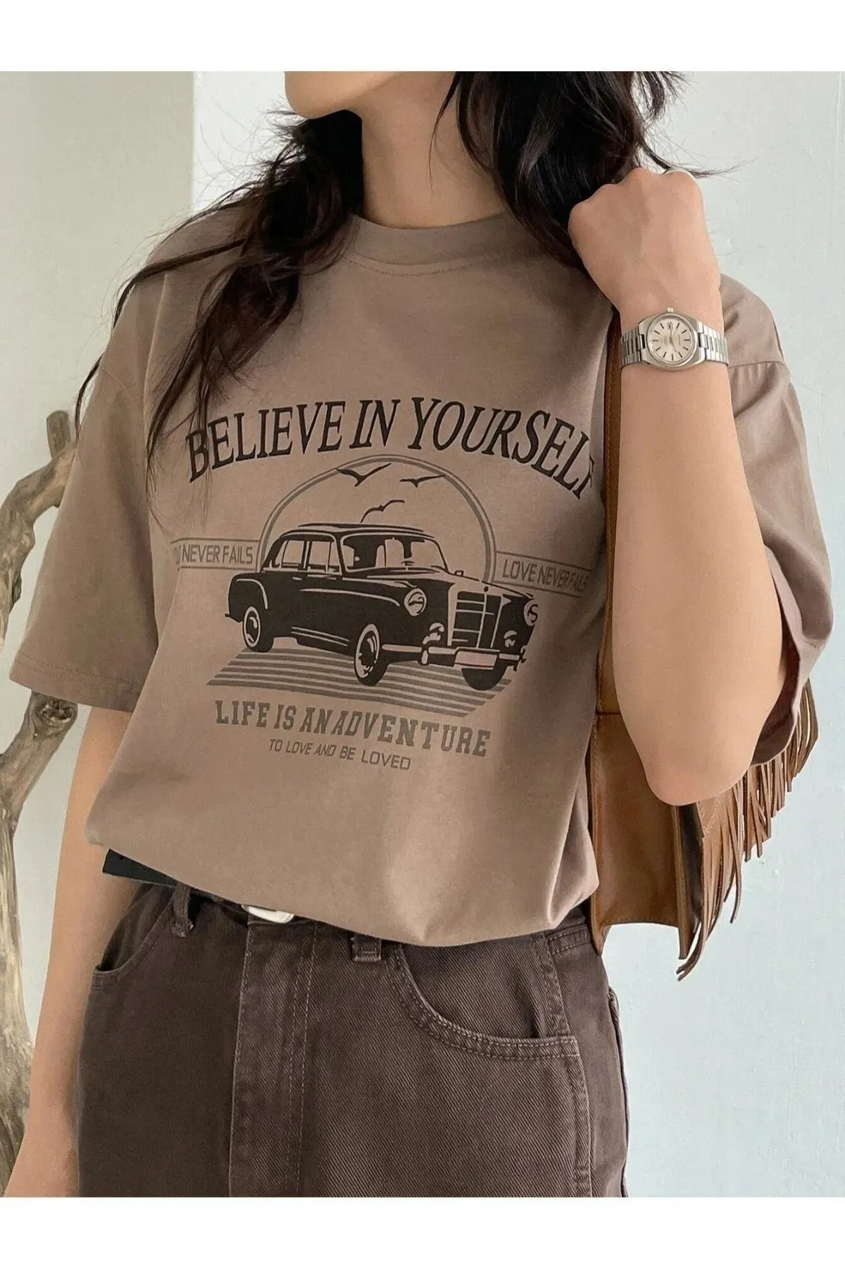 Know  Braunes, bedrucktes Oversize-T-Shirt „Believe In Yourself“ für Damen