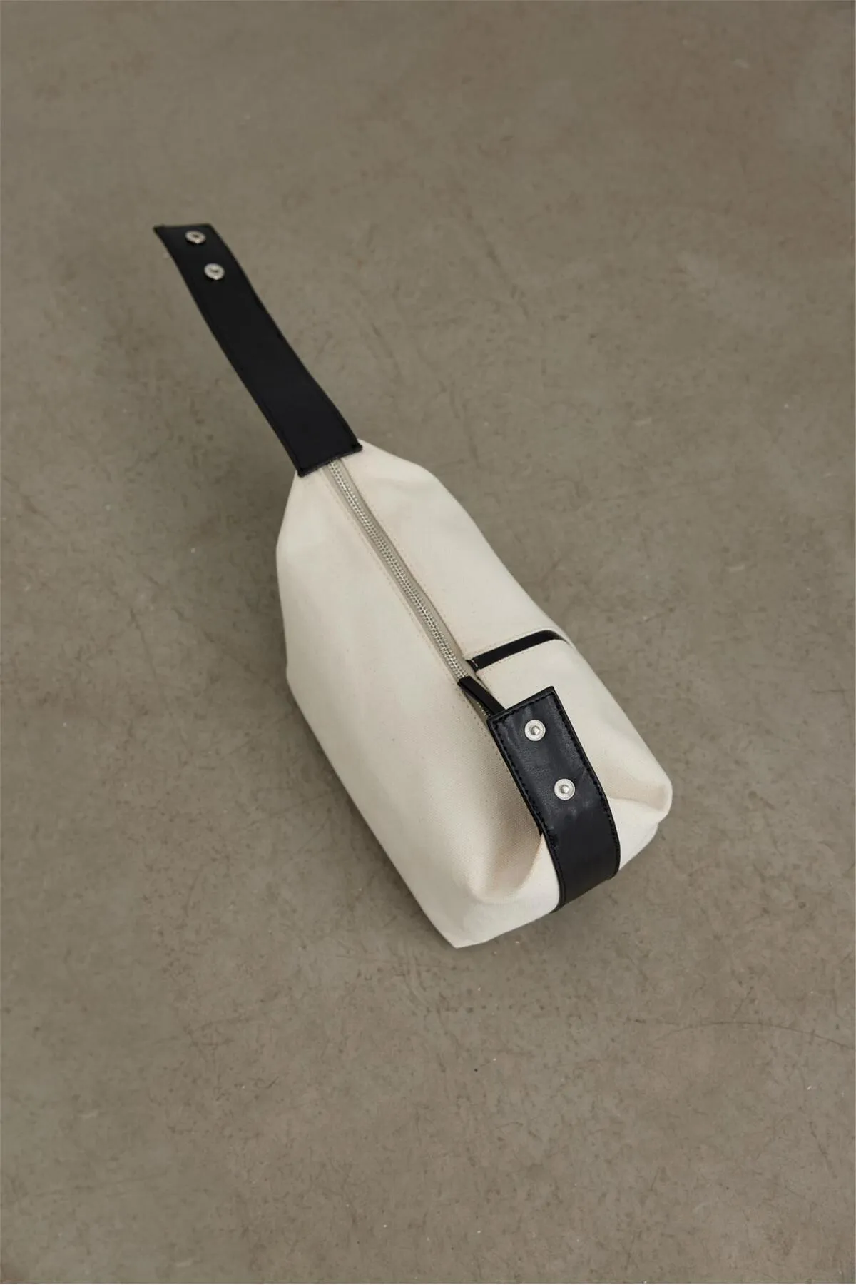 Suud Collection  Cremefarbene Mini-Tasche „Archi“