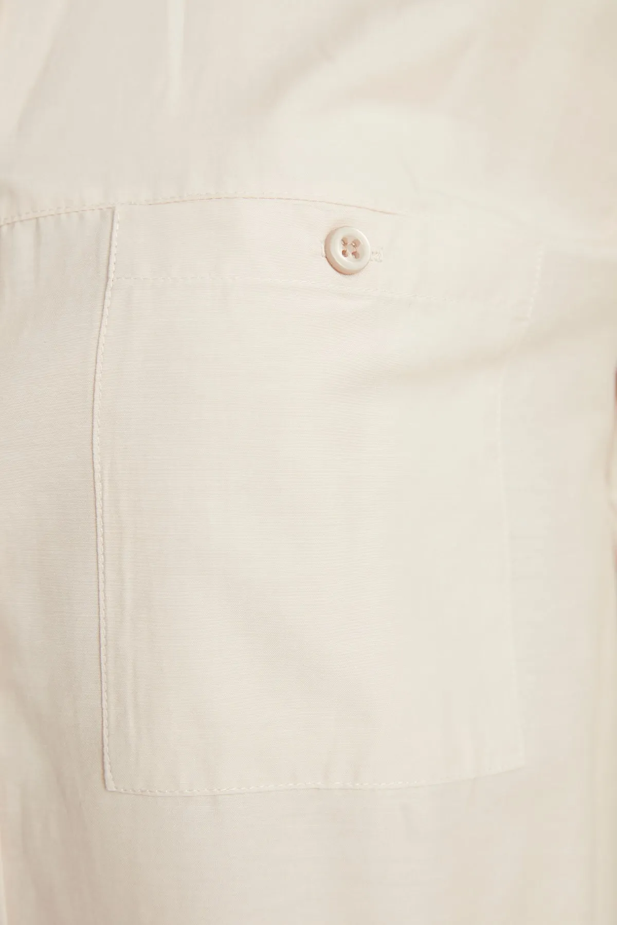 Trendyol Modest  Basic-Gewebtes Hemd mit steinfarbenen Ballonärmeln und langem Taschendetail auf der Rückseite TCTSS21GO0976