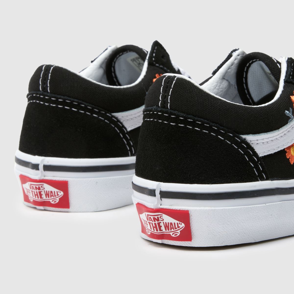 Vans svarta old skool blommiga flickor juniorsneakers