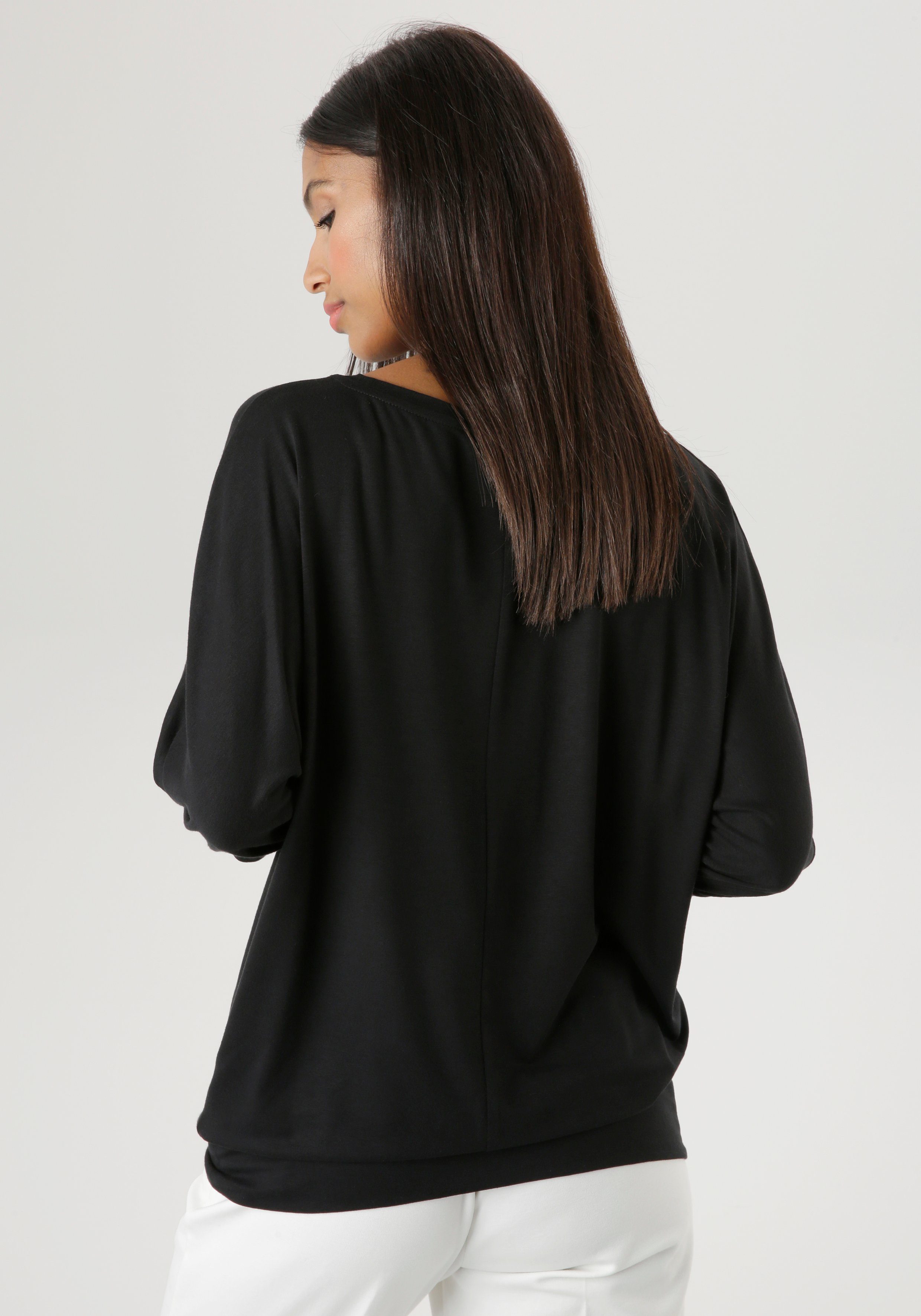 Aniston SELECTED Fledermausshirt mit abstraktem Gesichtsdruck - NEUE KOLLEKTION