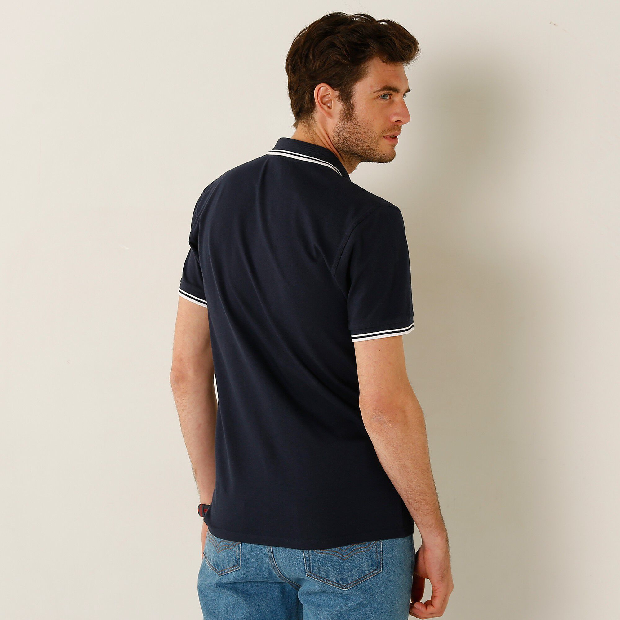 Polo uni maille piquée manches courtes