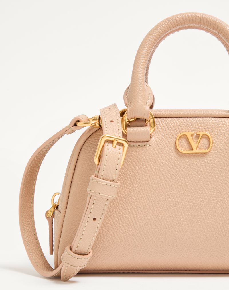 Bolsa tipo mochila Mini VLogo Signature em couro de bezerro granulado