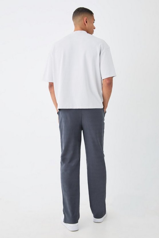 Gestreifte Jacquard-Jogginghose mit geteiltem Saum