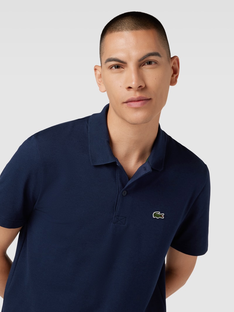 Regular Fit Poloshirt aus Baumwolle mit Label-Detail in marineblau