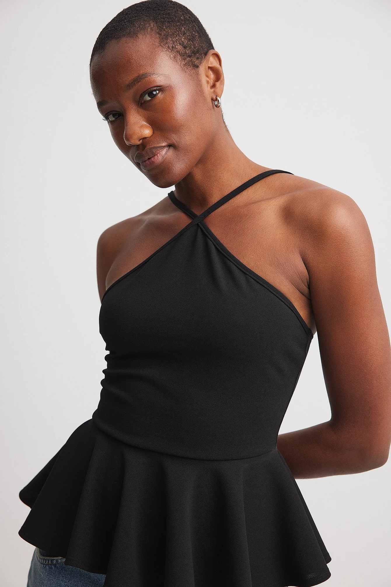 Peplum-Oberteil mit Neckholder-Ausschnitt