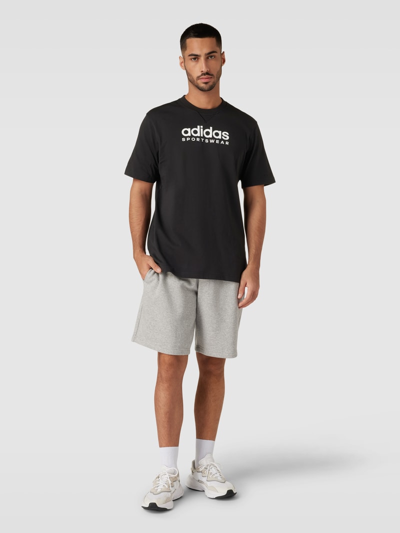 T-Shirt mit Label-Print in schwarz