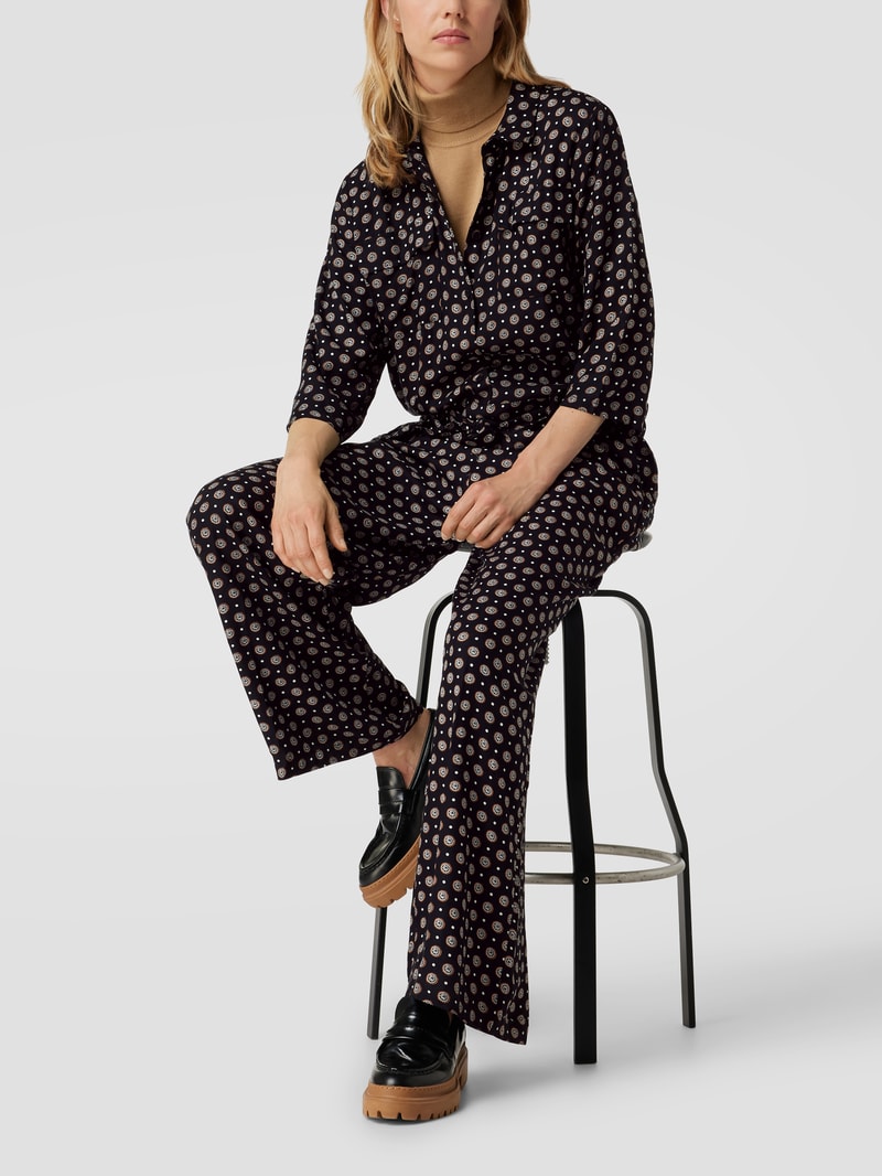 PLUS SIZE Jumpsuit mit Allover-Muster Modell 'Karutie' in schwarz