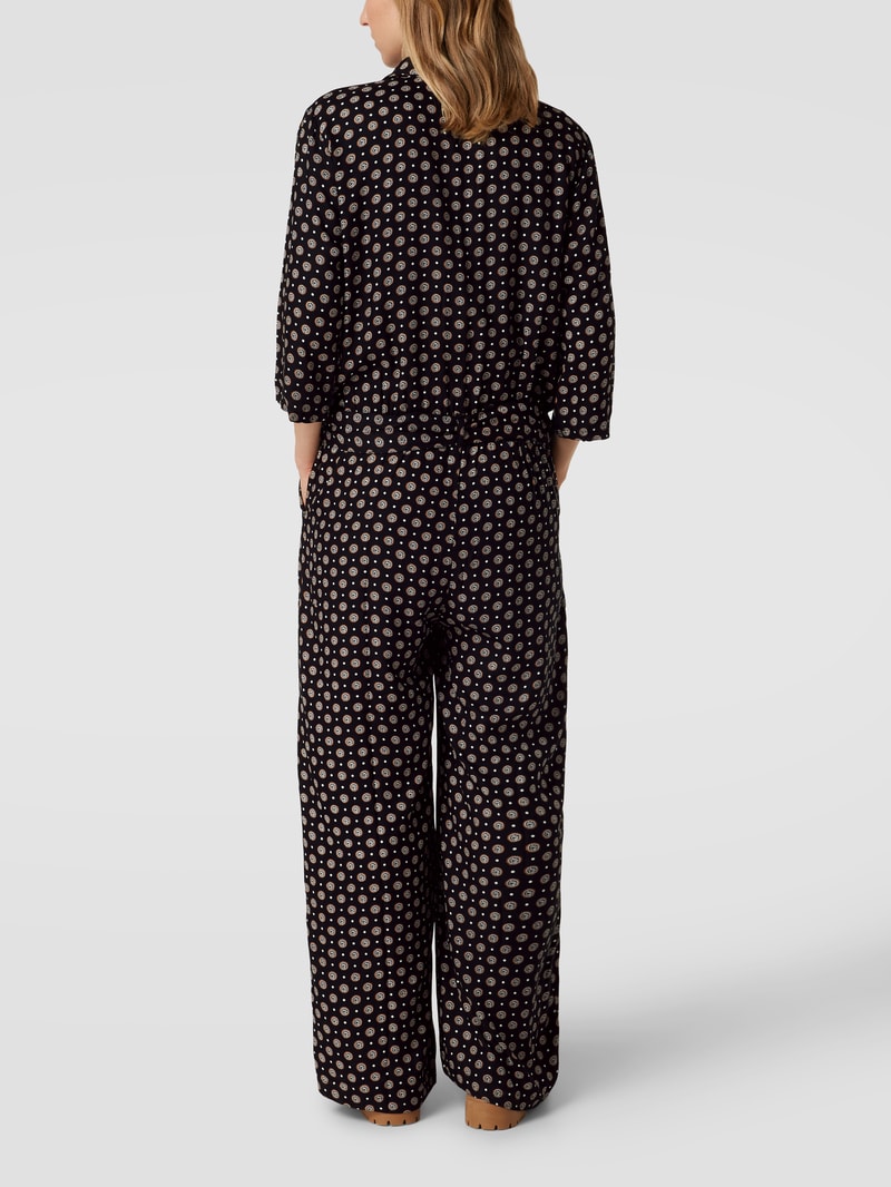 PLUS SIZE Jumpsuit mit Allover-Muster Modell 'Karutie' in schwarz