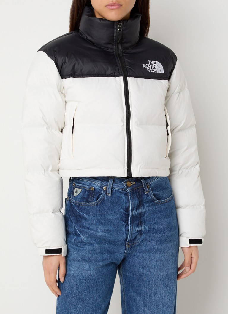 Jachetă din puf The North Face Nuptse cu izolație din puf și buzunare cu fermoar.