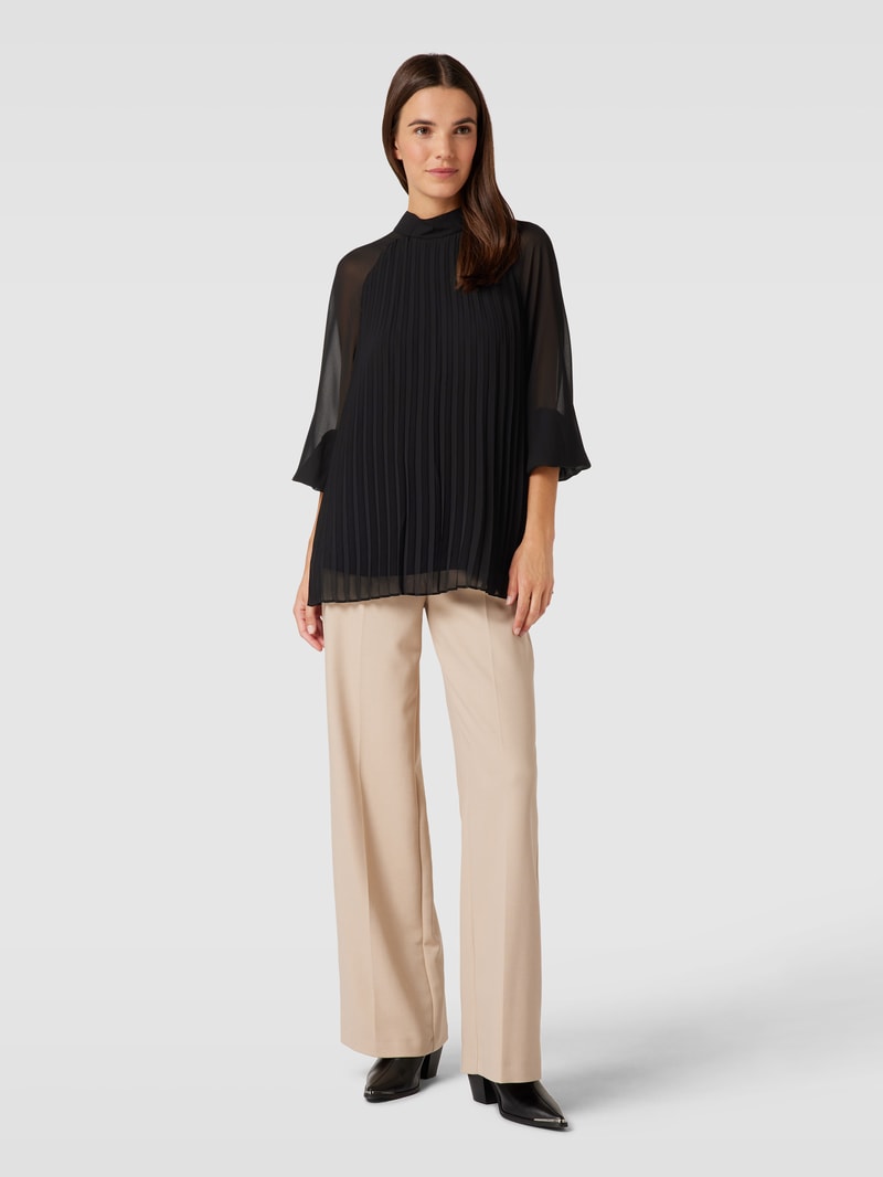 Bluse mit Plisseefalten in schwarz