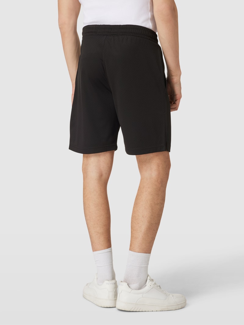 Shorts mit Camouflage-Muster in schwarz